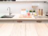 Wood table top on blur kitchen room